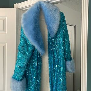 Festival coat. Completely lined. Never worn.